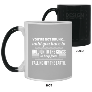 21150 11 oz. Color Changing Mug Unique design Falling Off The Earth