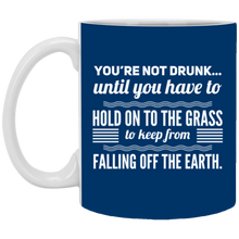 Load image into Gallery viewer, XP8434 11 oz. White Mug Unique design Falling Off The Earth